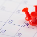 5 tacks on a single date on a calendar