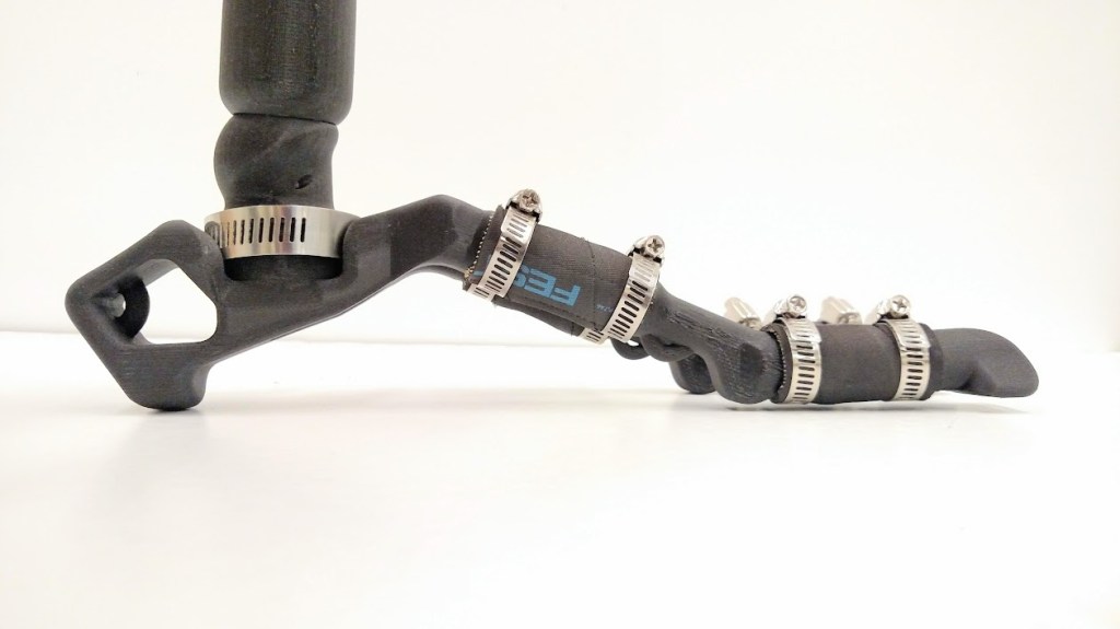 Designed robot foot using two toes and air muscles for joints instead of pins.